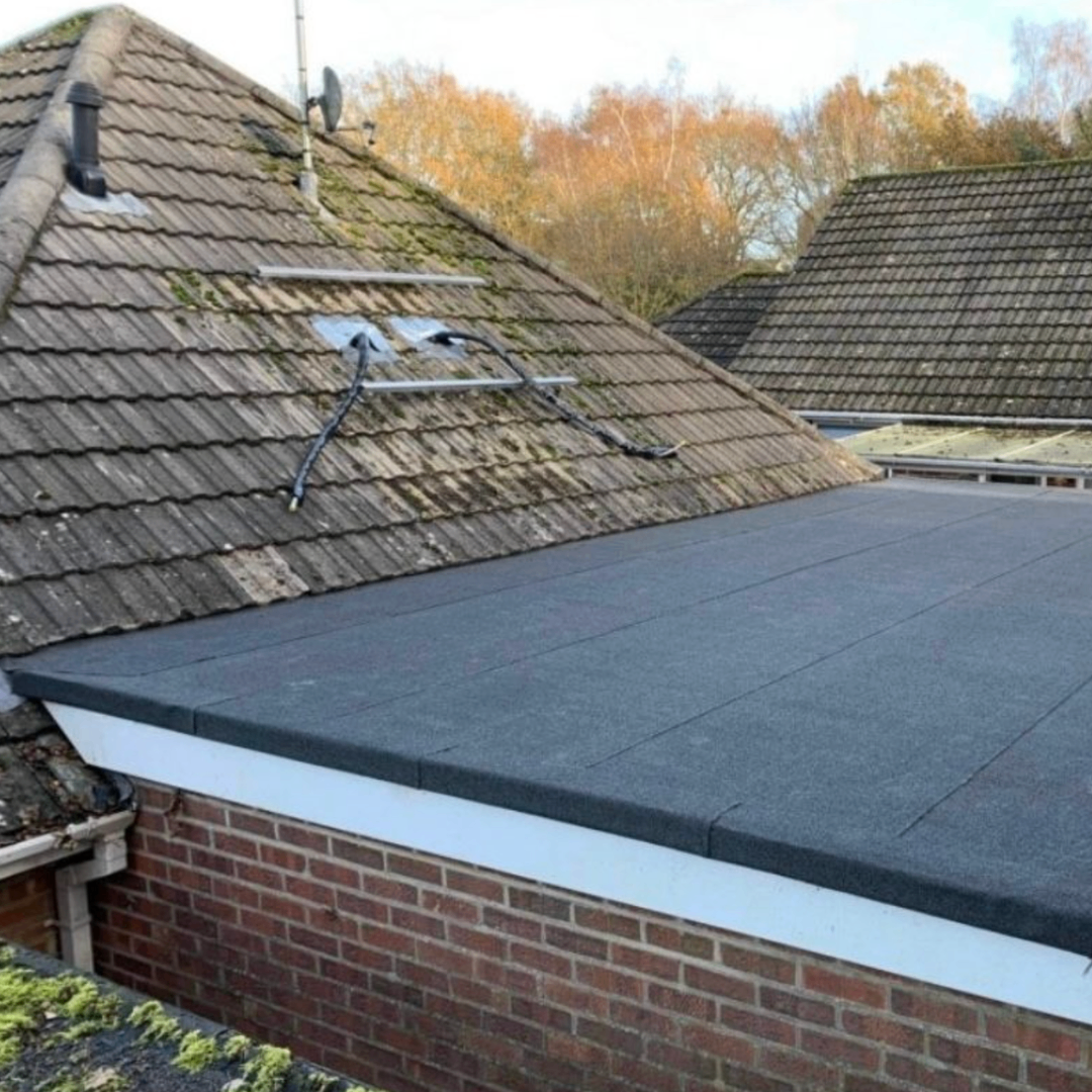 Flat roof installation with clean edge detailing