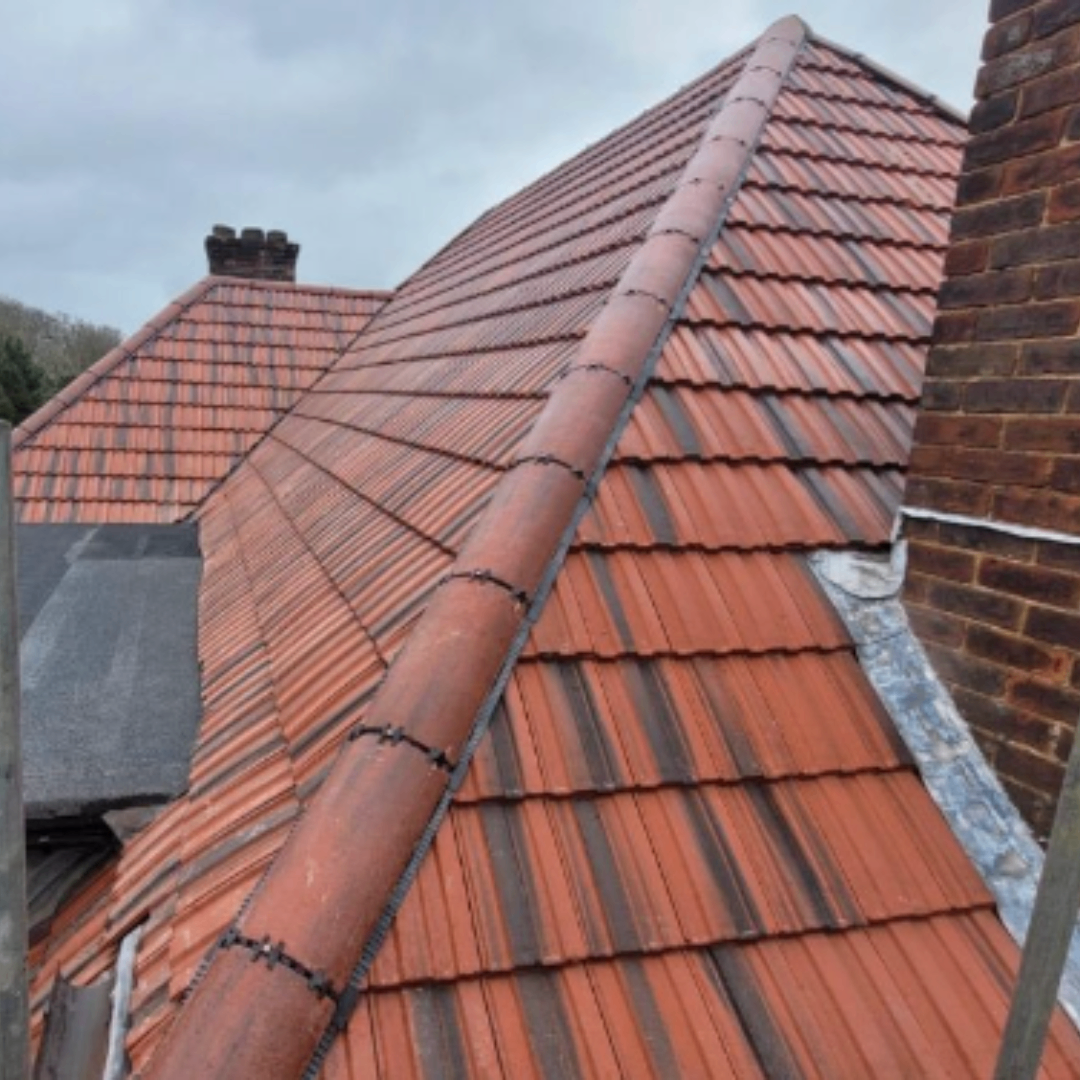 New pitched clay tile roof with ridge detail